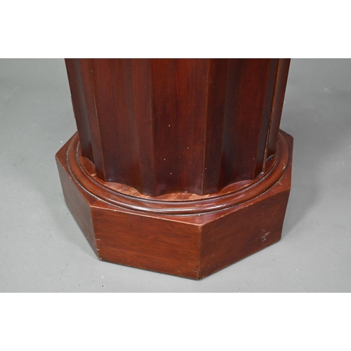 948 - A Victorian marble top mahogany cylinder pot cupboard, the fluted sides and door raised on a octagon... 