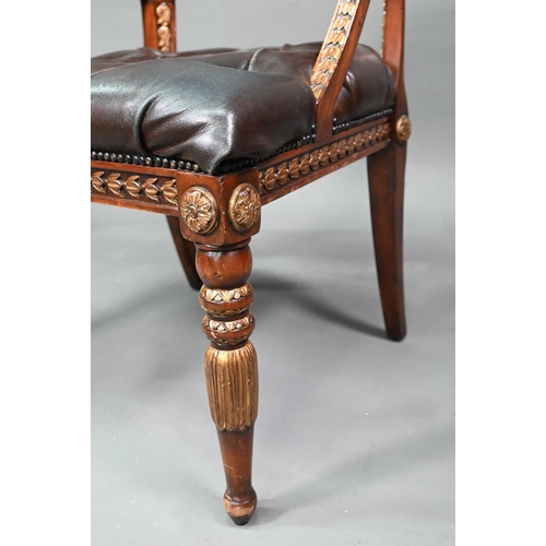 950 - Theodore Alexander, a part gilt decorated neo-classical style buttoned brown leather chair