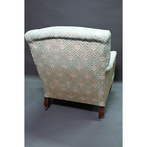 962 - An early 20th century easy armchair by Howard, in original green monogramed ticking, raised on squar... 