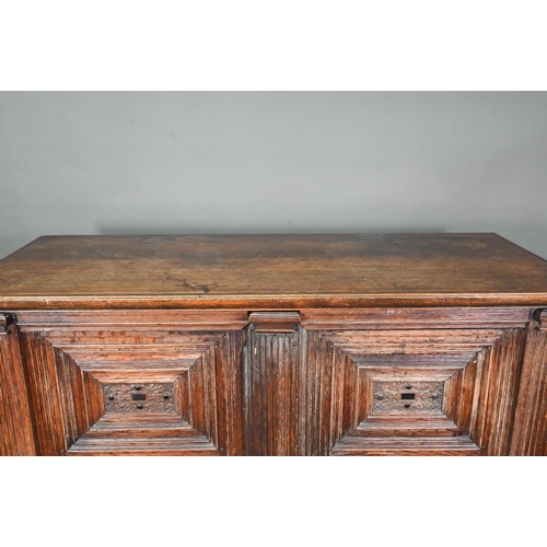 965 - A 17th century jointed oak cupboard, with two moulded panelled doors over a full width drawer, raise... 