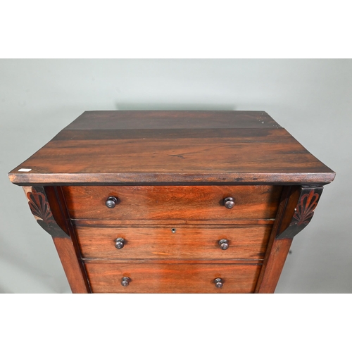 972 - A Victorian rosewood seven drawer Wellington chest, each with twin turned knobs, raised on a plinth ... 