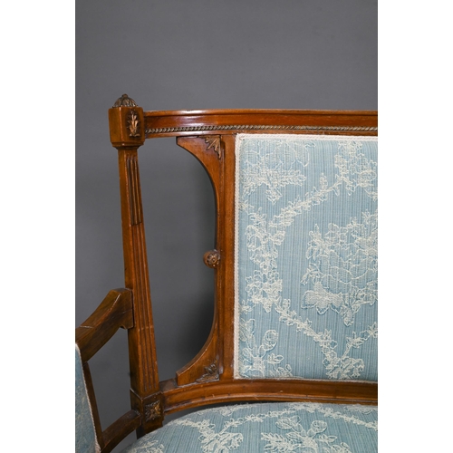 973 - An Edwardian walnut framed salon sofa, the back centred by a lyre splat flanked by fabric backrests,... 