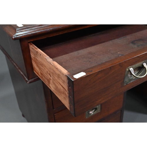 974 - A military mahogany twin pedestal campaign desk by 'Arthur Foley & Son, Salisbury, 1892', the gr... 