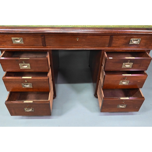 974 - A military mahogany twin pedestal campaign desk by 'Arthur Foley & Son, Salisbury, 1892', the gr... 