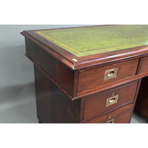 974 - A military mahogany twin pedestal campaign desk by 'Arthur Foley & Son, Salisbury, 1892', the gr... 