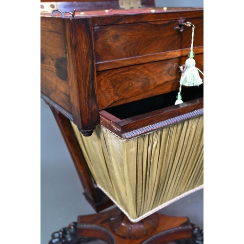 976 - A Regency rosewood work table, the hinged top enclosing a multi-division interior over a drawer and ... 