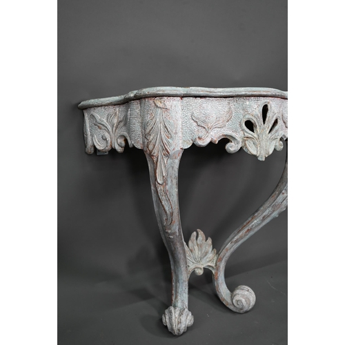 981 - An antique distress painted serpentine form console table, carved pine, raised on twin scroll legs u... 