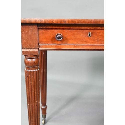 983 - A Victorian mahogany two drawer side table, raised on turned reeded legs to brass castors, 91 cm w x... 