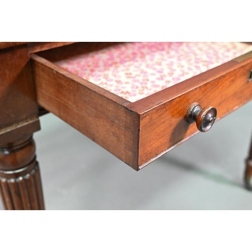 983 - A Victorian mahogany two drawer side table, raised on turned reeded legs to brass castors, 91 cm w x... 