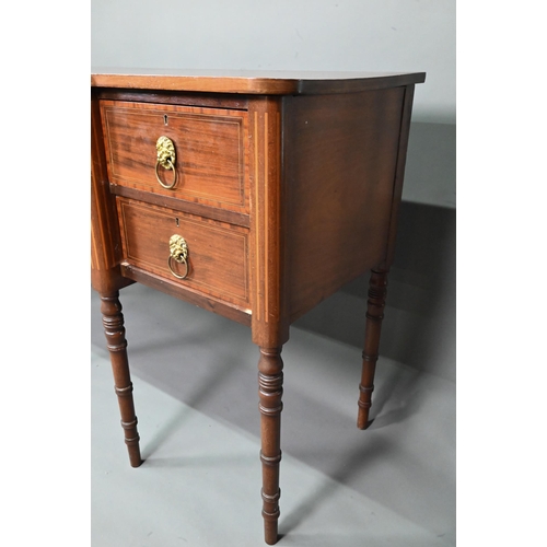 985 - A late 19th century Sheraton design mahogany breakfront sideboard, with an arrangement of six drawer... 