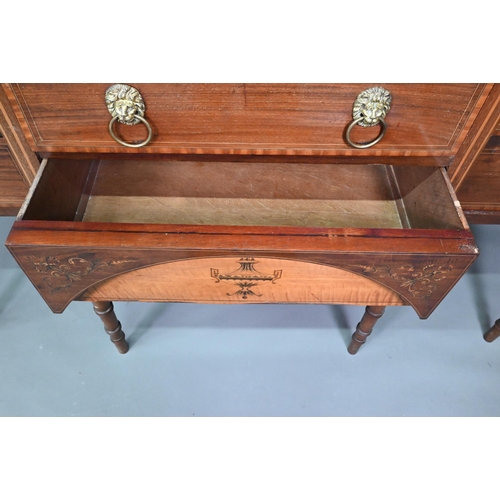 985 - A late 19th century Sheraton design mahogany breakfront sideboard, with an arrangement of six drawer... 