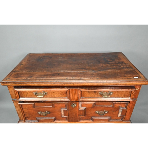 995 - A Jacobean and later oak chest of 4 long drawers in two sections, the drawers with applied geometric... 