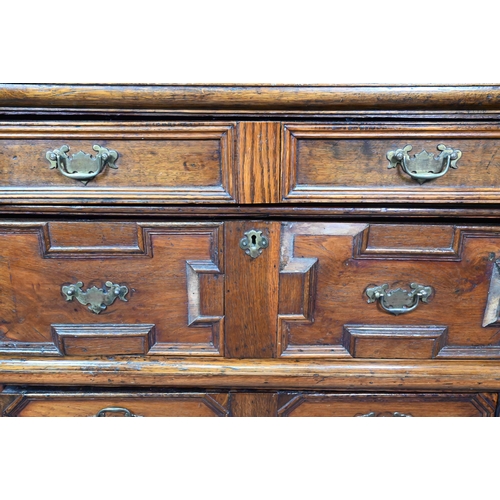 995 - A Jacobean and later oak chest of 4 long drawers in two sections, the drawers with applied geometric... 