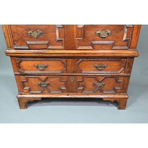 995 - A Jacobean and later oak chest of 4 long drawers in two sections, the drawers with applied geometric... 