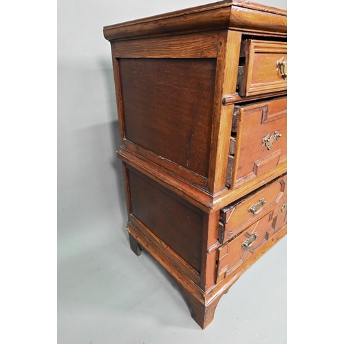 995 - A Jacobean and later oak chest of 4 long drawers in two sections, the drawers with applied geometric... 