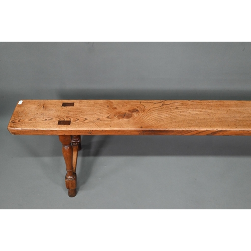 996 - A pair of elm plank benches, raised on turned frames, 200 cm x 18 cm x 45 cm h (2)