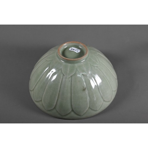 540 - A Chinese Song style celadon lotus bowl, evenly covered with an opaque sage green glaze, the interio... 