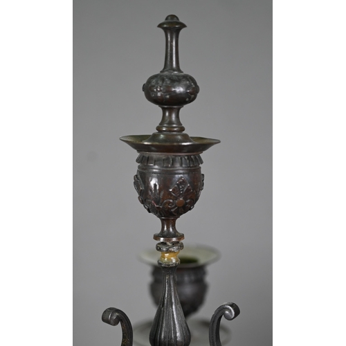 1080 - A pair of antique bronze patinated four branch candelabra, on tri-form bases and marble plinths, 54 ... 