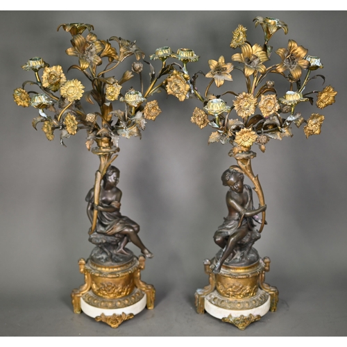 1081 - A good pair of French bronze, ormolu and marble six branch candelabra, the seated classical female f... 
