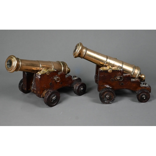 1082 - A pair of 19th century table cannons modelled on Garrison cannon, the 20 cm long bronze barrels on f... 