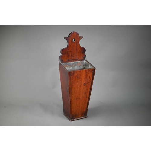 1093 - A 19th century mahogany candle-box of tapering form, converted as a wall-vase with tin liner