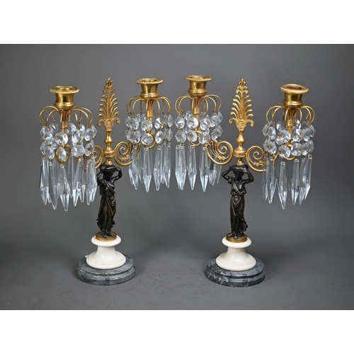 1094 - A fine pair of French Empire bronze, ormolu and marble crystal lustre drop two branch candelabra, 19... 