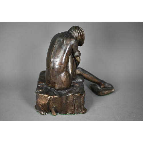 1096 - A bronze-patinated spelter figure, female nude study, seated on a square plinth, unsigned, 23cm high... 
