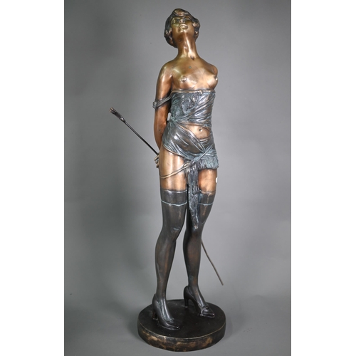 1099 - A large spelter 'risque' semi-nude figure in the Art Deco manner after Bruno Zach - 'The Riding Crop... 