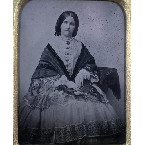 1136 - A 19th century Ambrotype photograph of a young lady, in gilt frame