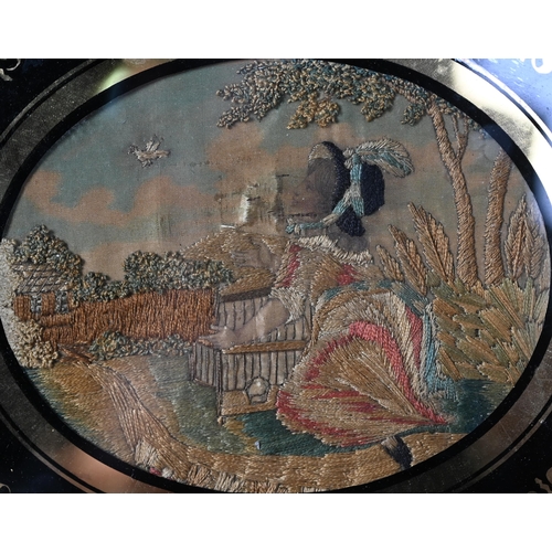 1142 - A pair of 19th century oval silk longstitch pictures of a young girl and a boy with birds in garden ... 