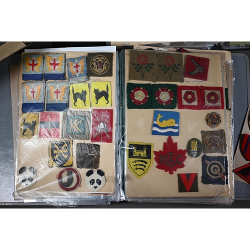 1153 - A large quantity of military patches, WWI and later, mostly British regiments, Divisions, rank insig... 