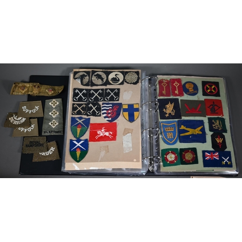 1153 - A large quantity of military patches, WWI and later, mostly British regiments, Divisions, rank insig... 