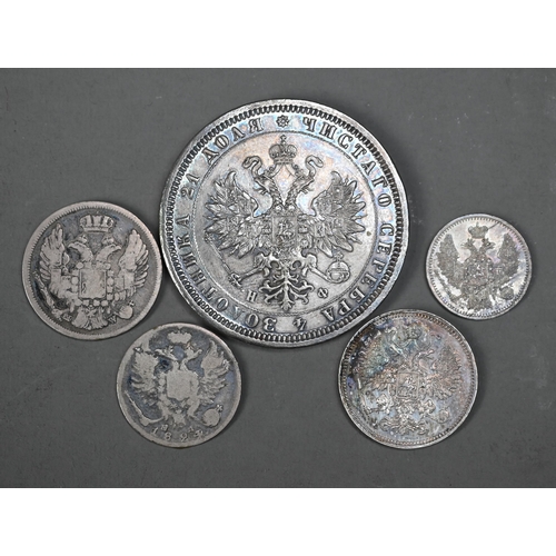 1167 - A collection of mostly 19th century silver coinage, including British, Empire, USA, Russia, Europe a... 