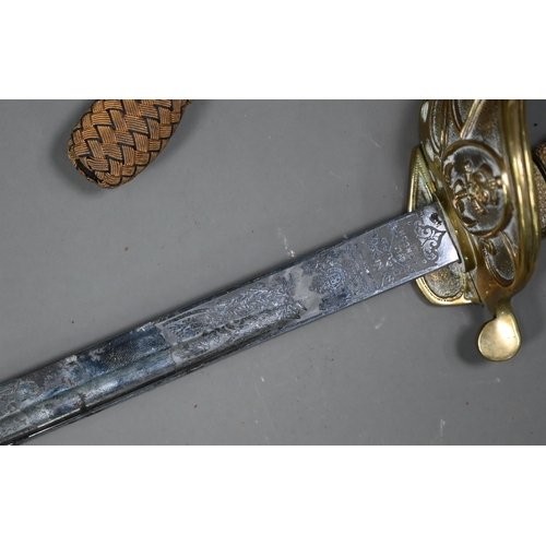 1294 - A Royal Navy officer's sword by Wilkingson of London, the badge etched with a crowned anchor, the so... 