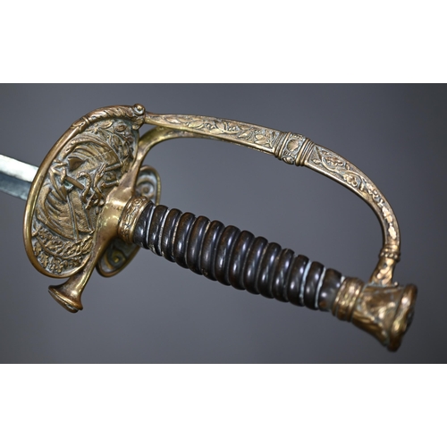 1303 - A 19th century officer's court sword, the plain steel blade 77 cm long, with solid cast brass guard ... 