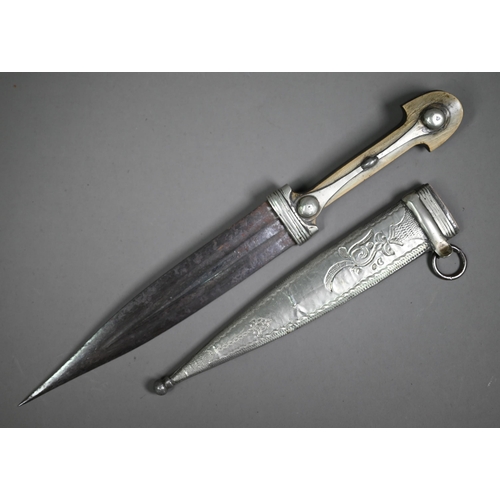 1314 - An antique Eastern dagger, the twin fullered 18 cm blade with horn panelled grip, in white metal sca... 