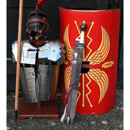 1291 - Reproduction Roman armour - a segmented steel breast/shoulder tunic, on wooden stand to/with a shiel... 