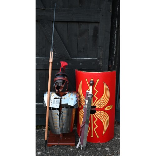 1291 - Reproduction Roman armour - a segmented steel breast/shoulder tunic, on wooden stand to/with a shiel... 