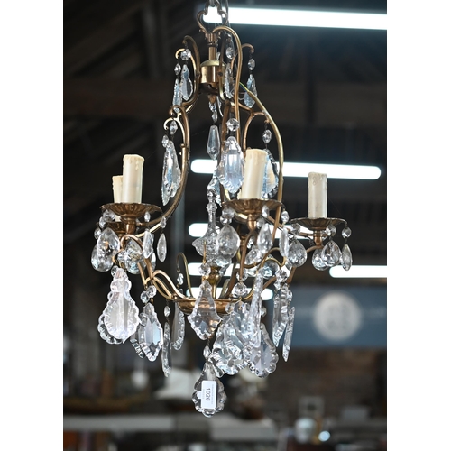 1026 - A gilt brass and crystal glass hung five branch electrolier, approx. 40 cm dia. x 60 cm h