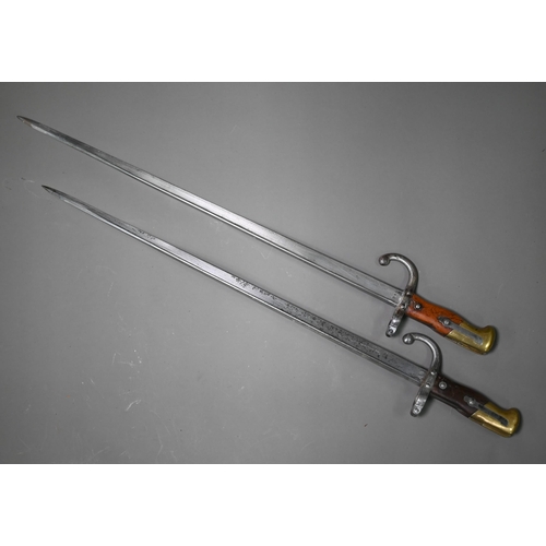 1318 - Two 19th century French sabre bayonets, with 52 cm steel blades, marked St Etienne 1877/78 (no scabb... 