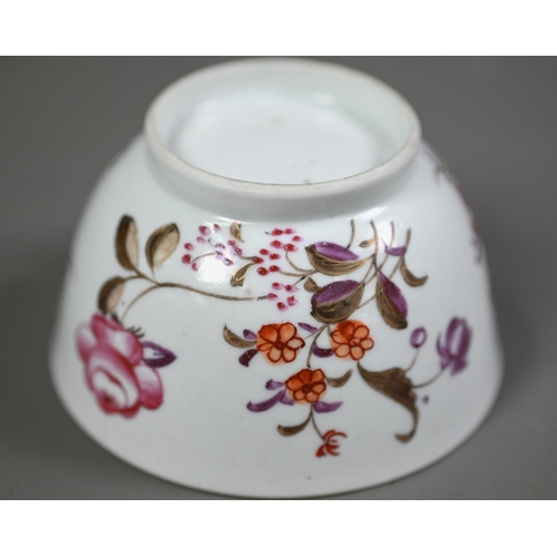 650A - A New Hall tea bowl and saucer with floral and pink scale decoration, to/w a similar coffee cup and ... 