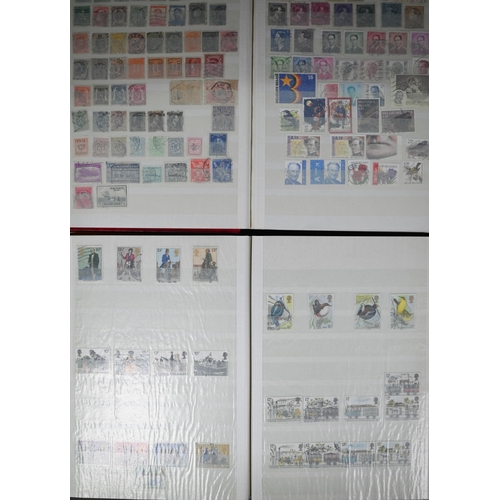 1133 - A collection of Queen Elizabeth II postage stamps - Machins and commemoratives, loose and in albums,... 