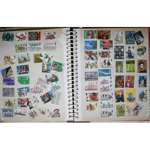 1134 - An album of Victorian and later British, Empire and foreign postage stamps, to/w two other albums an... 