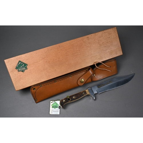 1311 - Puma Bowie knife with 20 cm blade and two piece antler handle, in leather scabbard and pine presenta... 