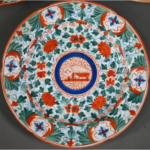 687 - A Regency Minton part dinner service, painted with the 'Crazy Cow' pattern, no. 106, comprising seve... 