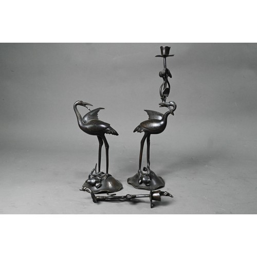 578A - A pair of Japanese Tsuru-Game crane and turtle bronze candle sticks, 33 cm high (one damaged) to/w t... 