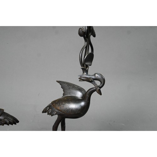 578A - A pair of Japanese Tsuru-Game crane and turtle bronze candle sticks, 33 cm high (one damaged) to/w t... 