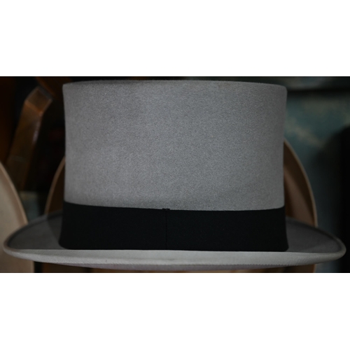 1284 - A vintage black silk top hat by Morgan of Dublin in fitted leather hatbox by R Erskine to/w a grey f... 