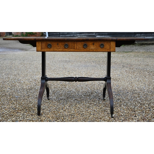 978 - A Regency cross-banded burr walnut sofa table, with two frieze drawers opposing dummy drawer fronts,... 