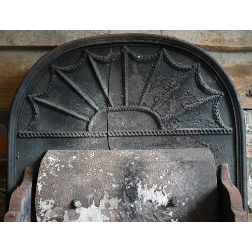 1037 - A large antique Adam style cast iron and steel fire grate, approx. 120 cm w x 39 cm deep x 96 cm hPr... 